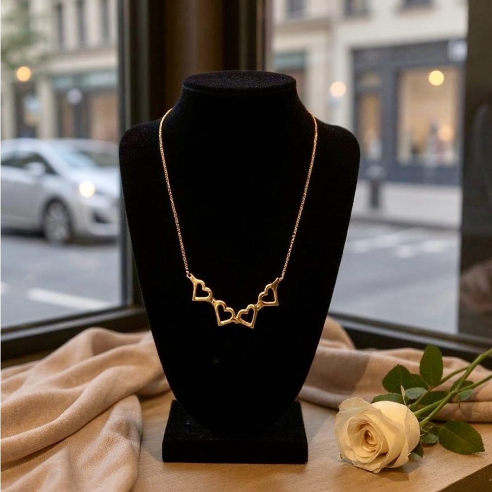 VTG SIGNED AVON GOLD TONE CONNECTED OPEN HEARTS CHAIN NECKLACE